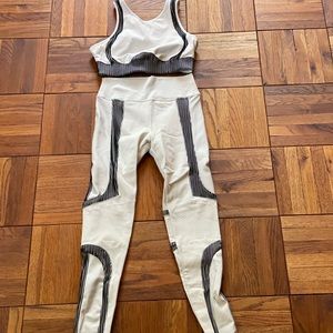 ALO Electric workout set in cream and black.